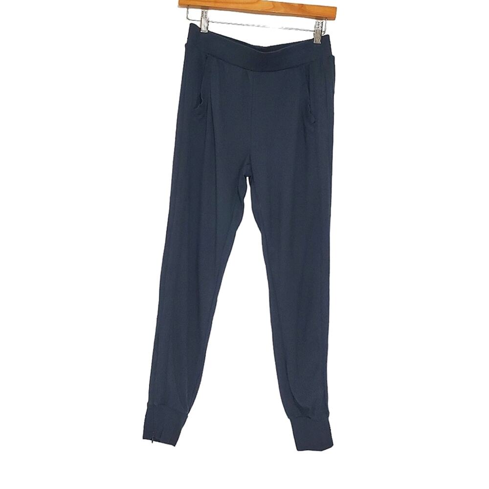 Fabletics | Green Piping Ankle Zip Joggers with Pockets